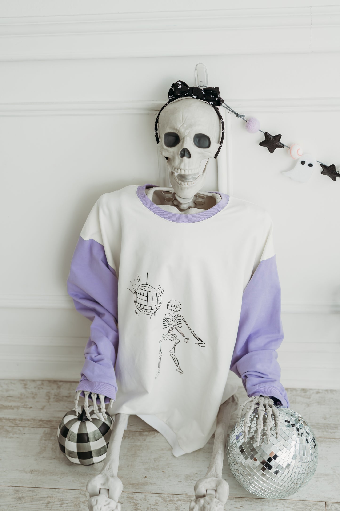 skeleton in skeleton sweatshirt